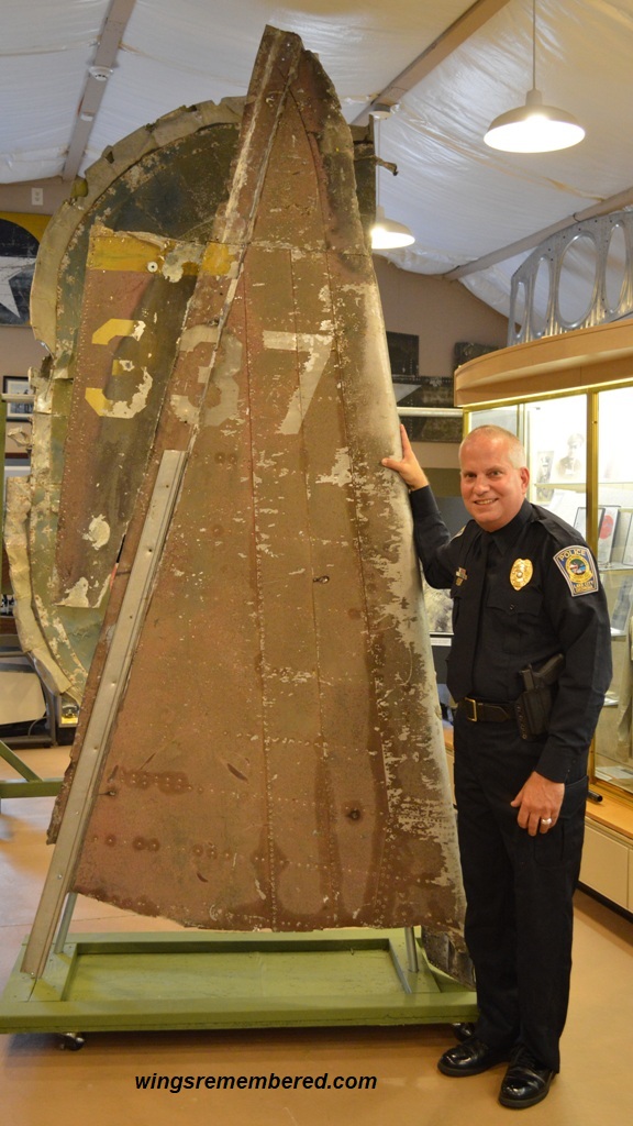 Edward Klacik's nephew Mike Madron of the Lake City, GA  Police Force with the vertical from his uncle's B-26